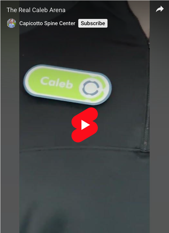 A close up Caleb Arena's name tag.